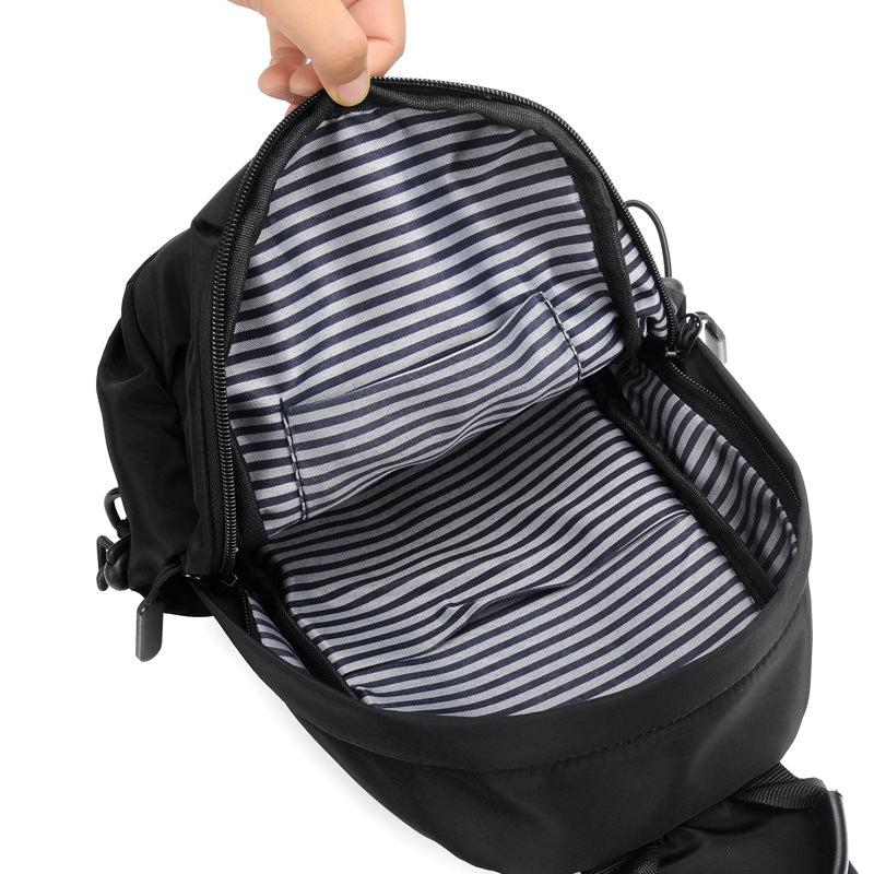 Sling backpack with multiple compartments Bowlift