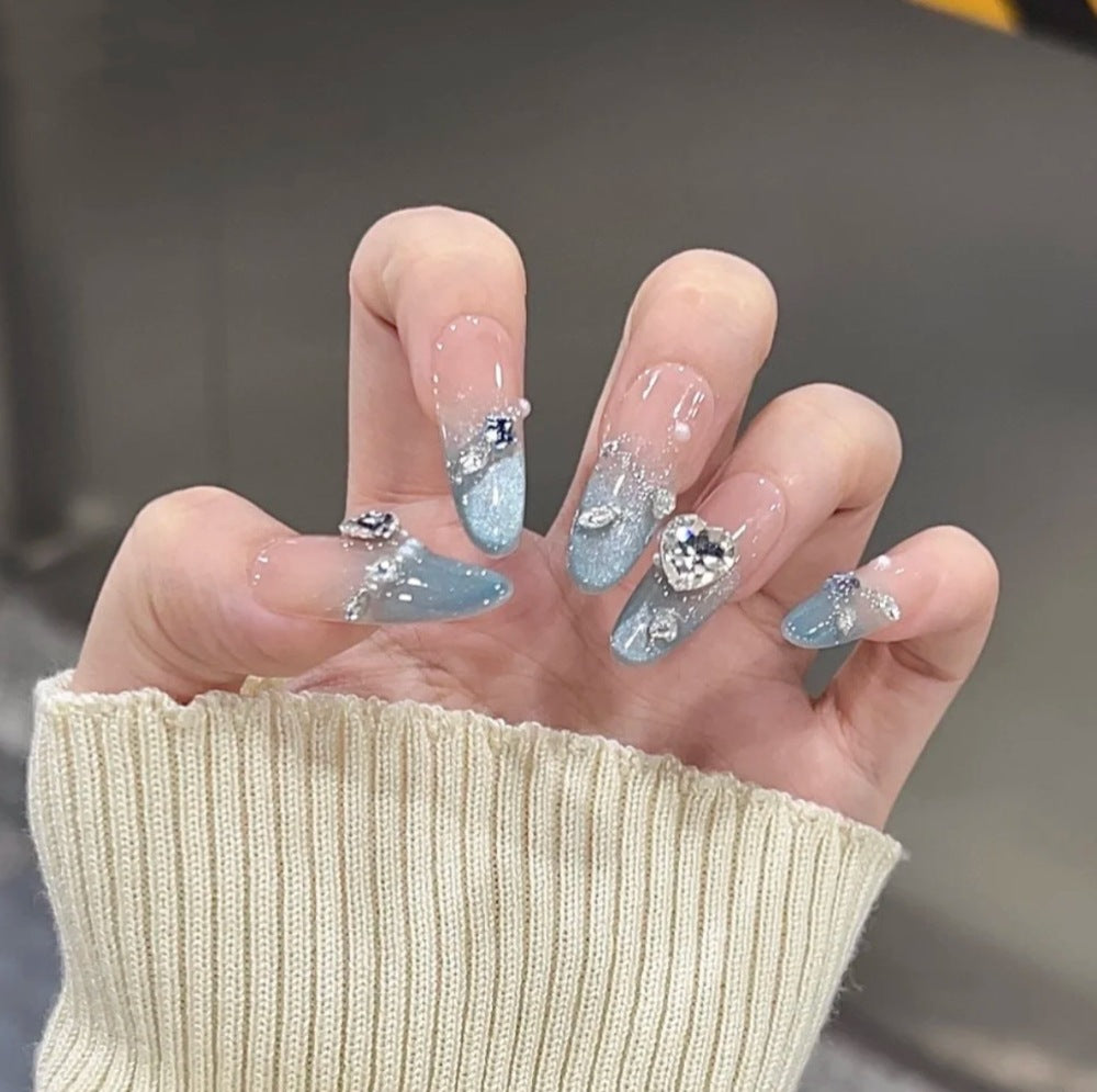 Artificial nails with modern glitter design Bowlift