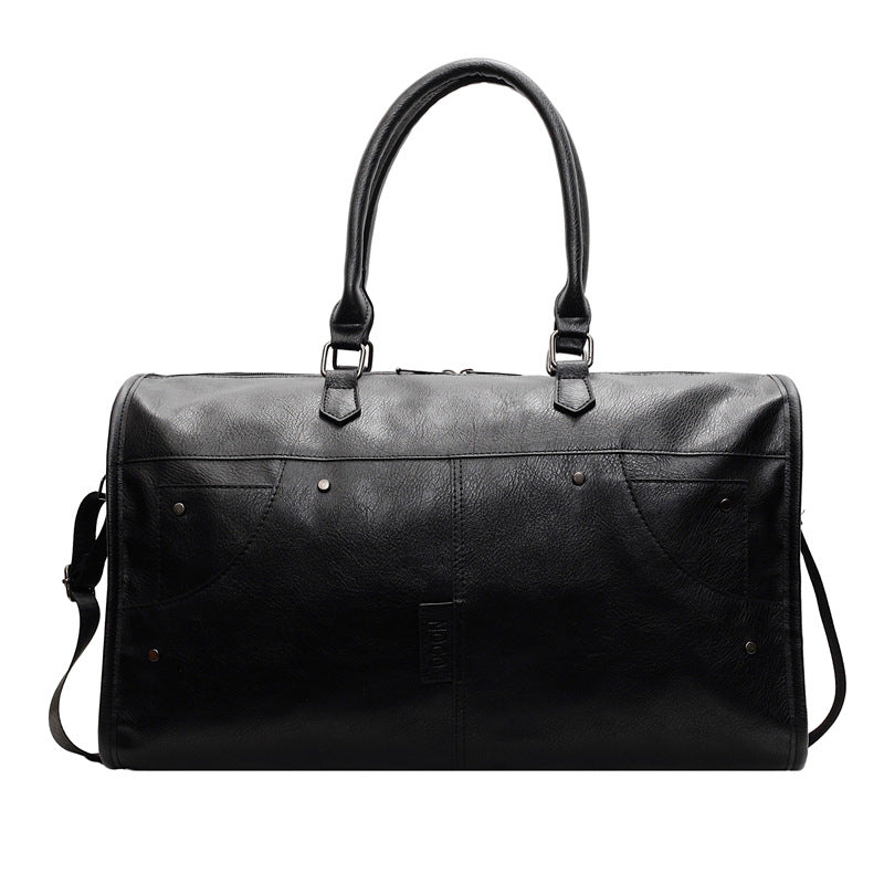 Elegant leather bag with stylish design and versatile carrying options Bowlift