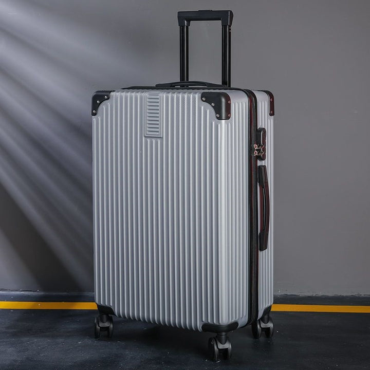 Hard shell suitcase with 360-degree wheel system and integrated safety feature Bowlift