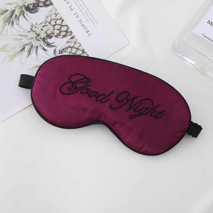 Unisex embroidered contoured sleep mask with decorative text embroidery and adjustable elastic band Bowlift