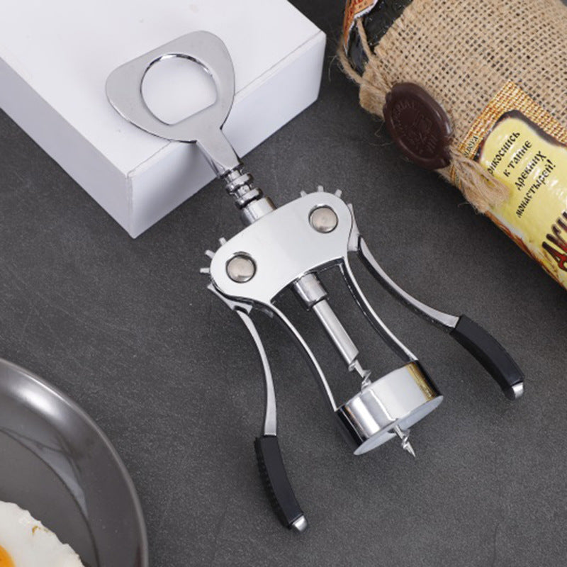 Winged corkscrew with integrated bottle opener and ergonomic rubberized lever handles Bowlift