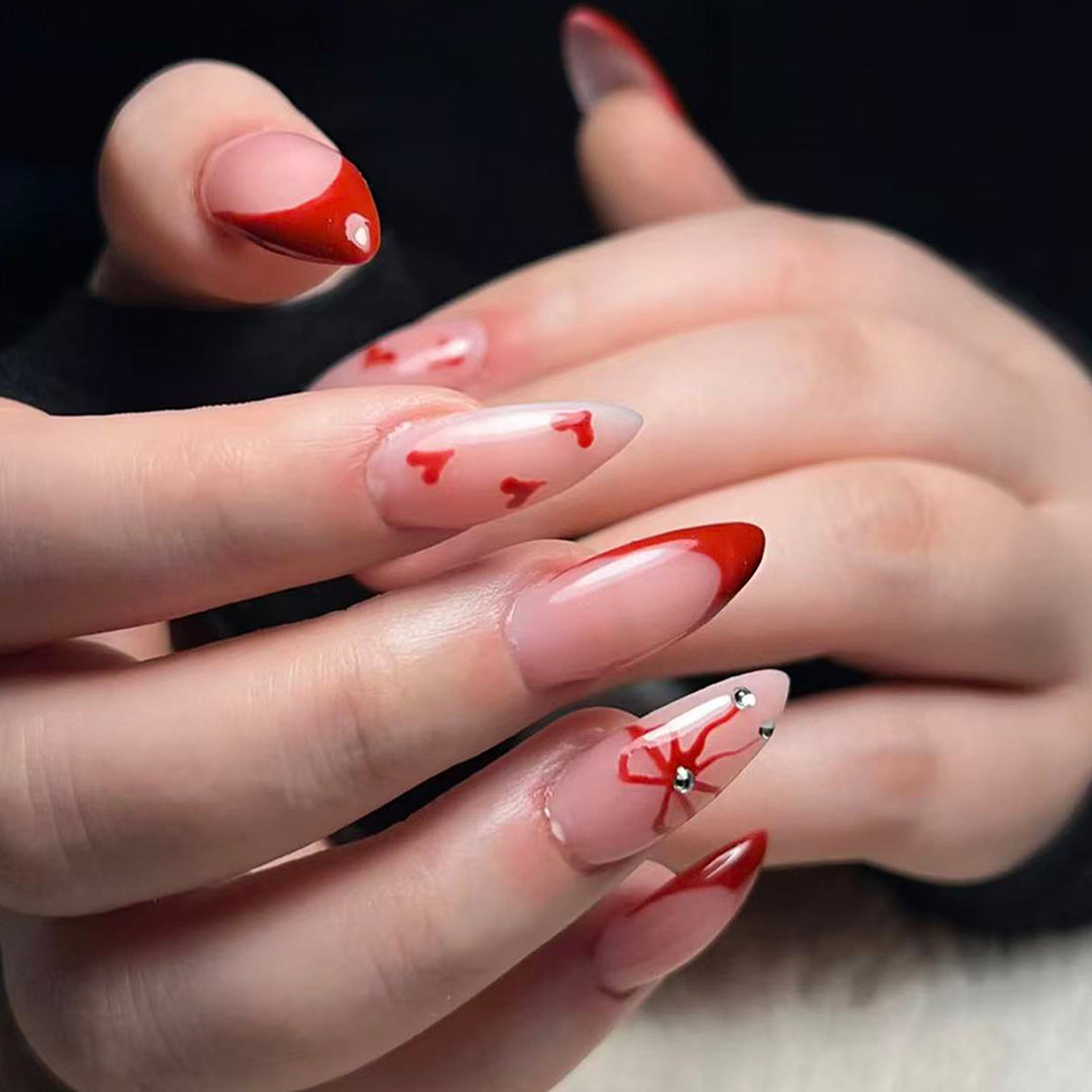 Artificial nails with elegant heart designs and glamorous accents Bowlift
