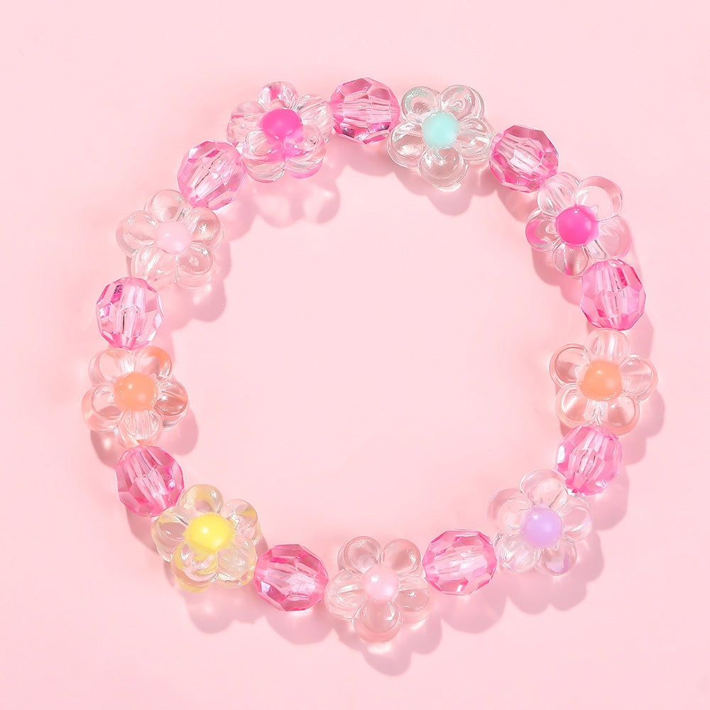 Friendship bracelet with colorful flower motifs Bowlift