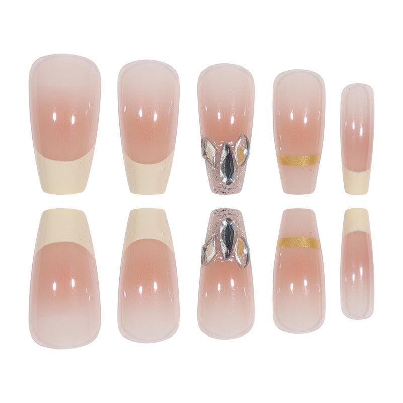 Elegant Long Press-On Nails with Rhinestone and Gold Accents Bowlift