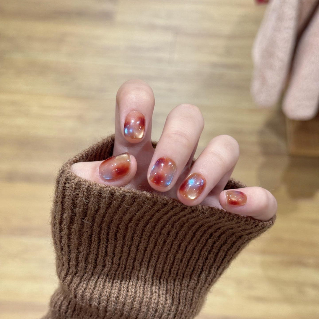 Artificial nails with shimmering galaxy patterns Bowlift