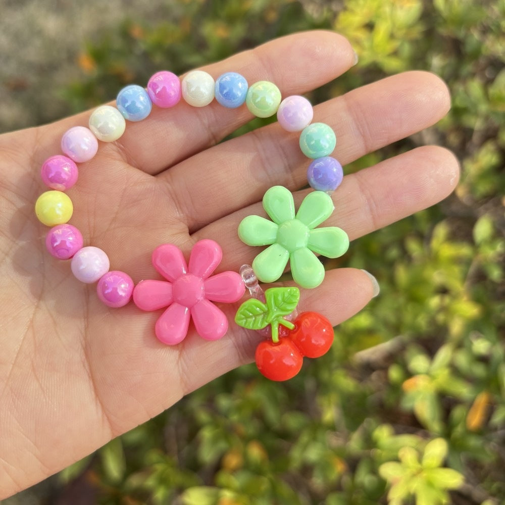 Colorful bracelet with flower charms Bowlift