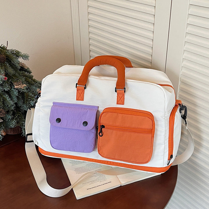 Sporty travel bag with multifunctional outer pockets Bowlift