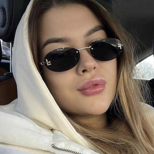 Sleek Metal Oval Sunglasses Bowlift