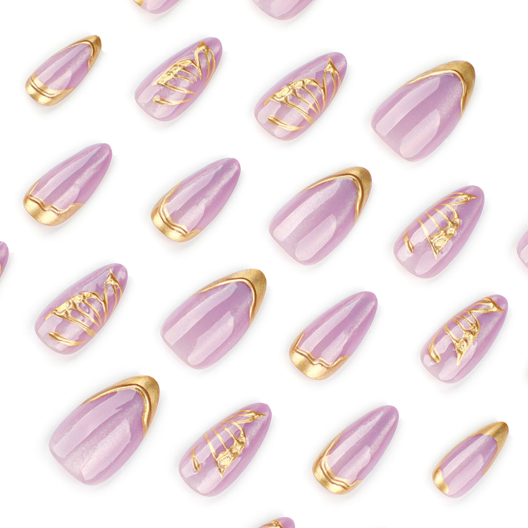 Artful Nail Extensions with Golden Accents Bowlift