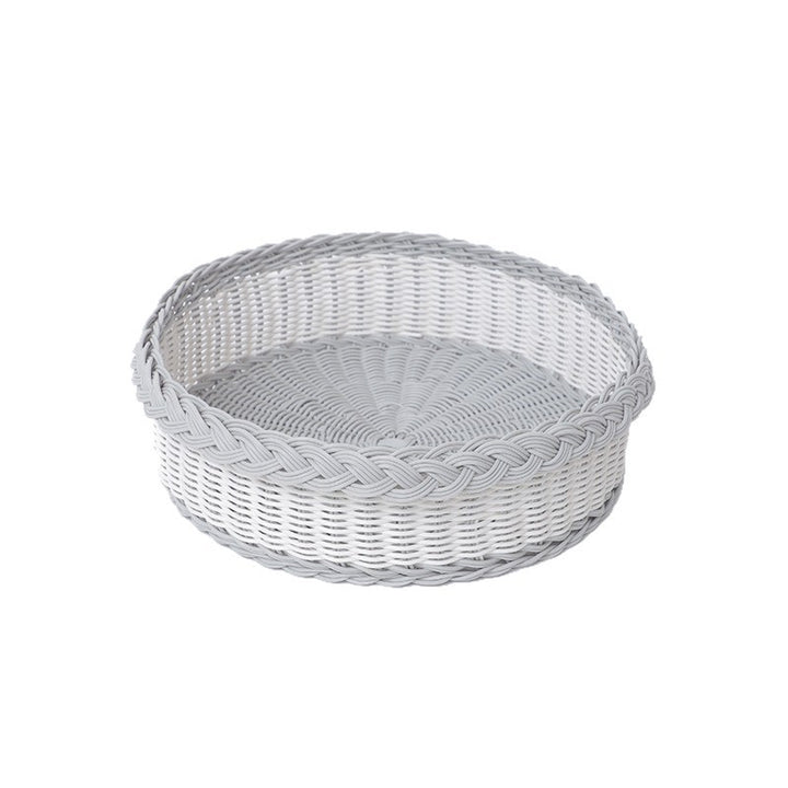 Handwoven storage basket with decorative edge