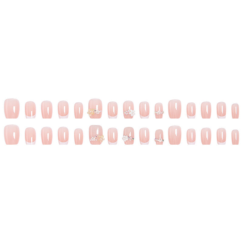 Nail set with elegant flower appliqués and exquisite glitter embellishments Bowlift
