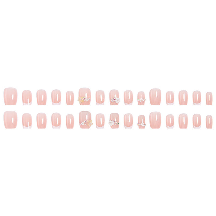 Nail set with elegant flower appliqués and exquisite glitter embellishments Bowlift