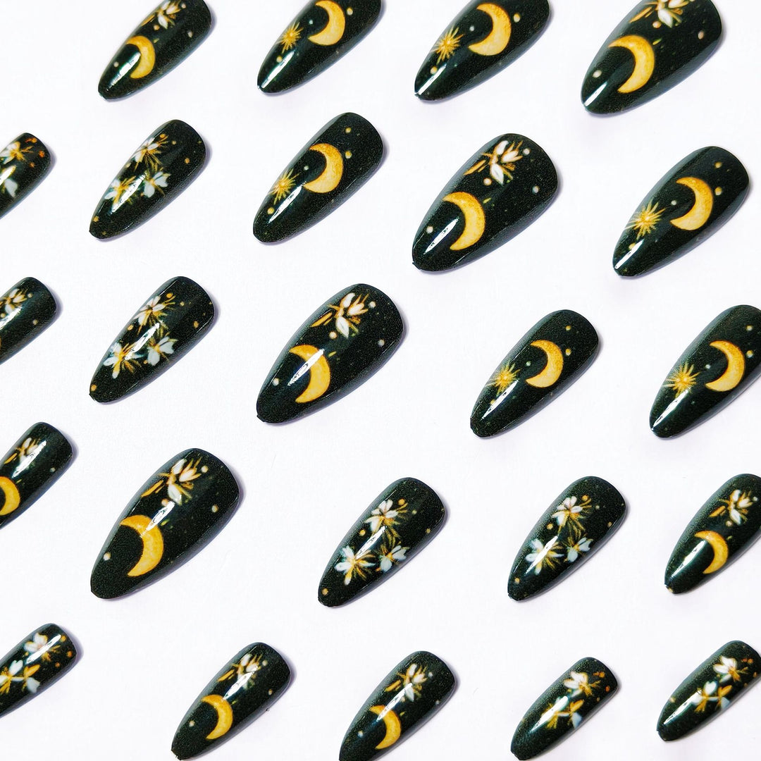 Glamorous artificial nails with moon and flower motifs Bowlift