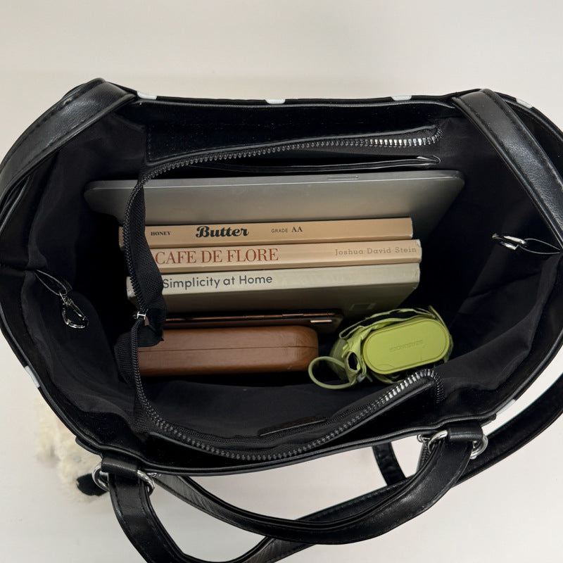 Plush shoulder bag with playful dog motif Bowlift