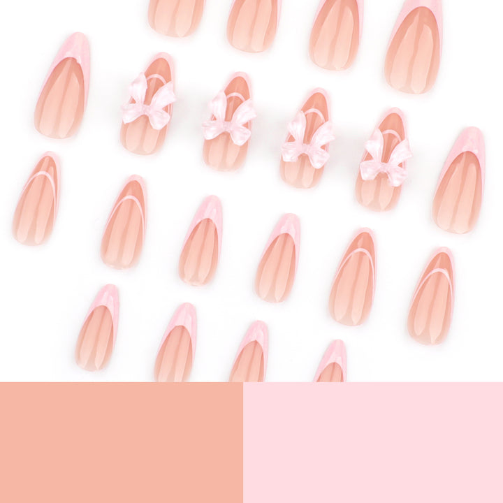 Artistic Nail Extensions with Transparent Bow Accents Bowlift