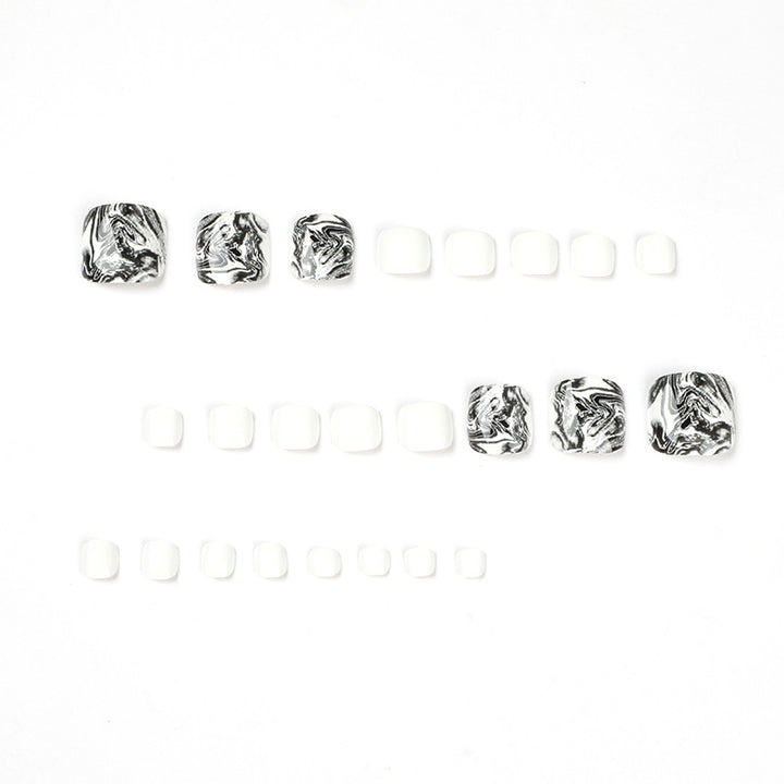 Artful toenail art in elegant marble design Bowlift
