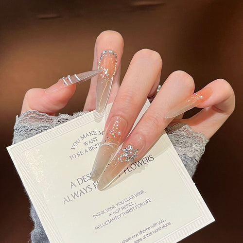 Elegant Stiletto Press-On Nail Extensions with Rhinestones Bowlift