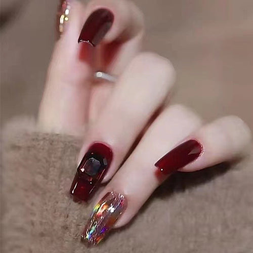 Glamorous artificial nails with crystal elements Bowlift