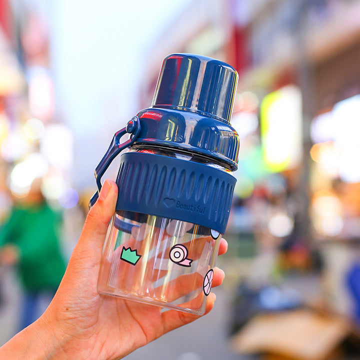 Ladies trendy glass drinking bottle with practical silicone protection Bowlift