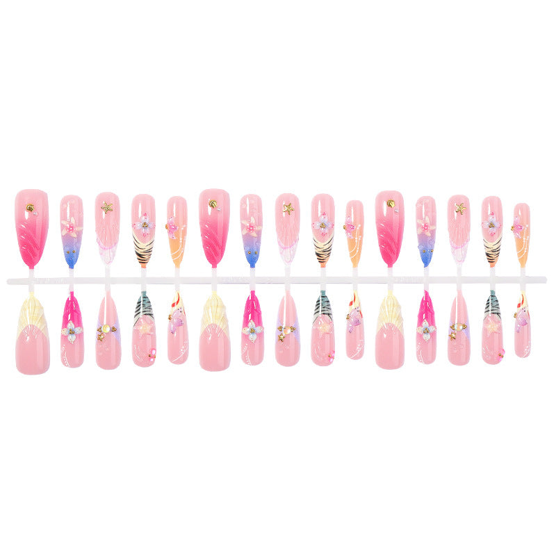 Creative nail art set with luxurious floral and glitter accents Bowlift
