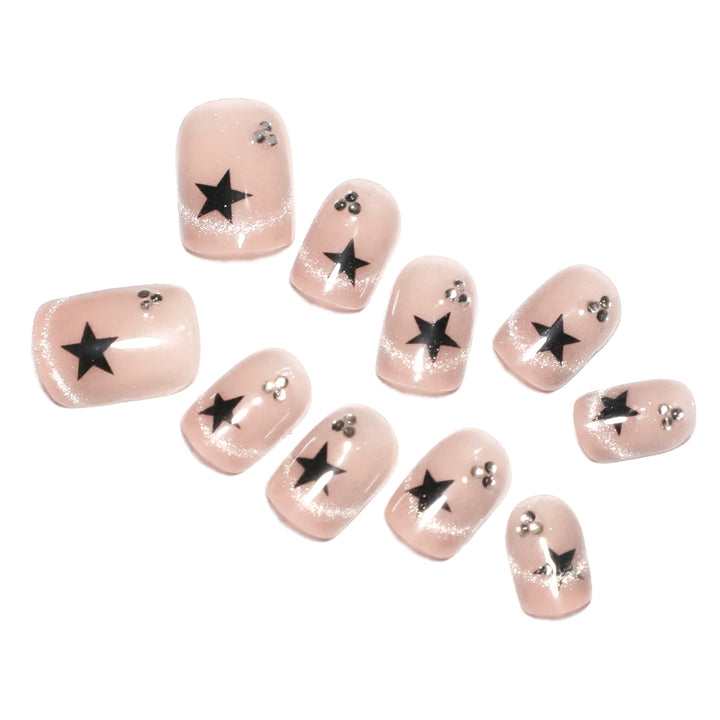 Artistic acrylic nails with glamorous star motifs Bowlift