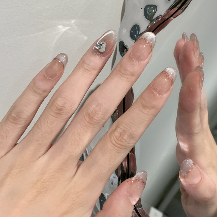 Elegant Press-On Nail Set with Jewel Accents Bowlift