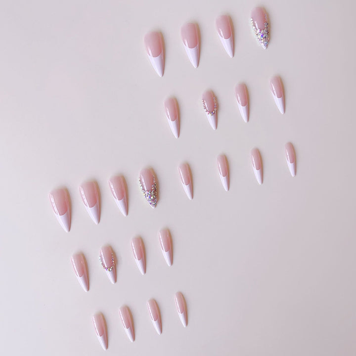 Artificial nail set with glamorous rhinestone decorations and elegant tips Bowlift