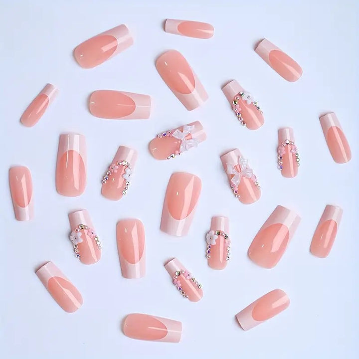 Artificial nails with elegant 3D bows and glitter accents Bowlift