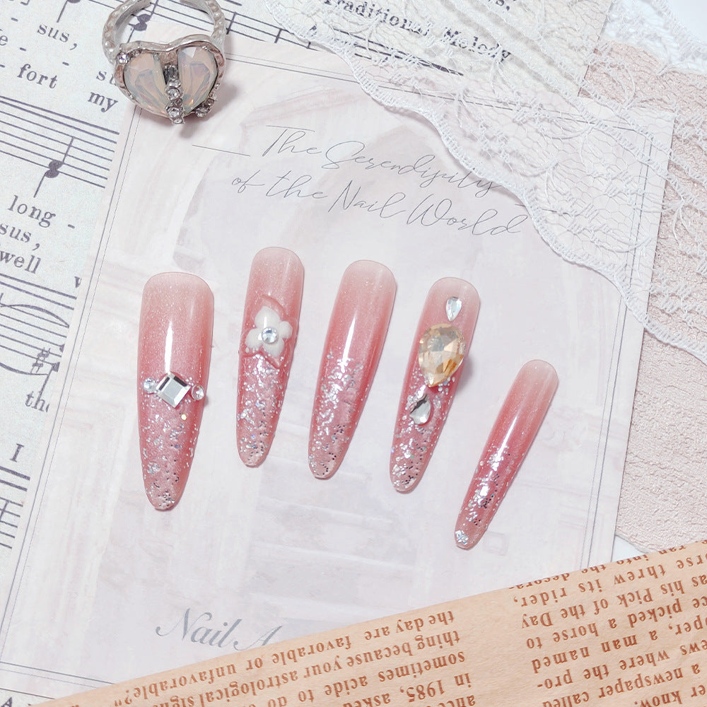 Shiny artificial nails with rhinestones and glitter Bowlift