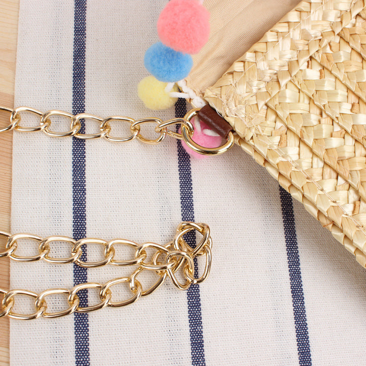 Clutch Bag Made of Handwoven Straw with Decorative Pompons Bowlift