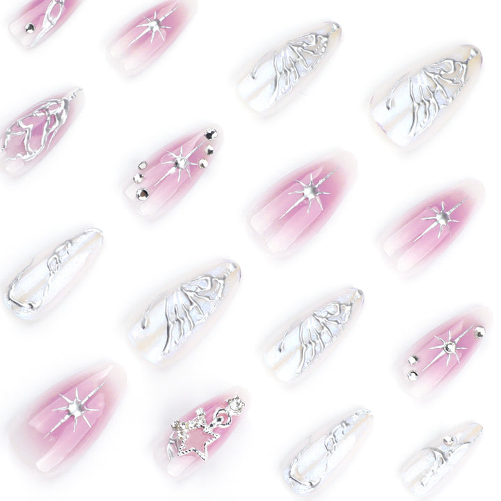 Artistic nail art with unique 3D decorations and glitter accents Bowlift