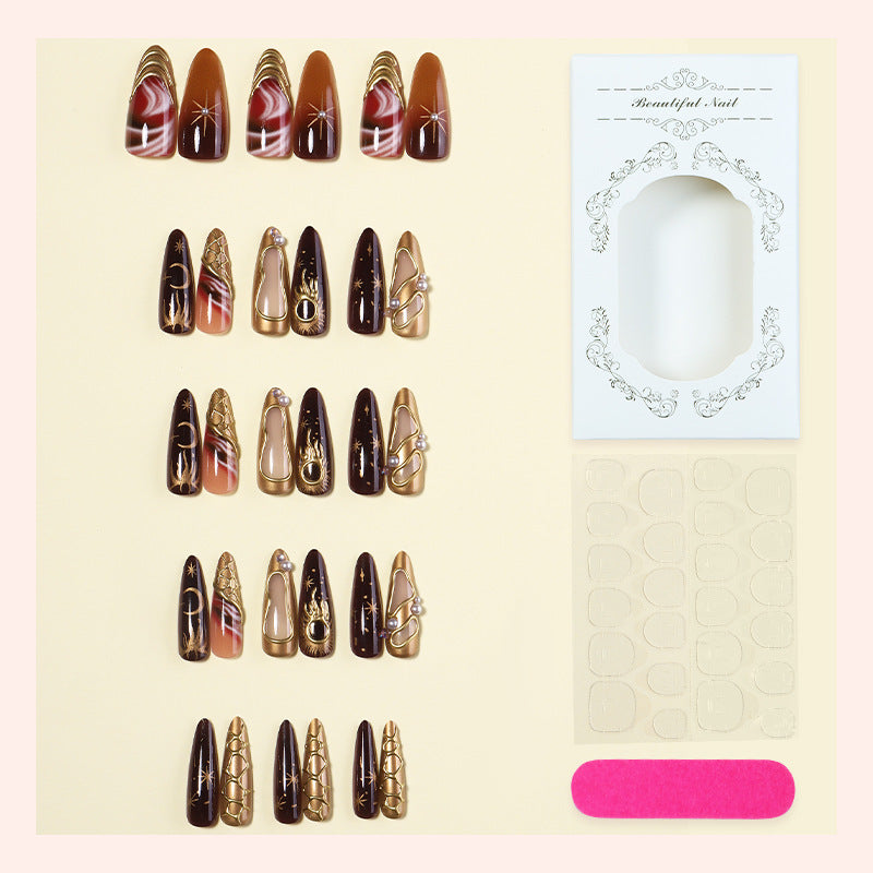 Artificial nail set with elegant gold accents and unique designs Bowlift