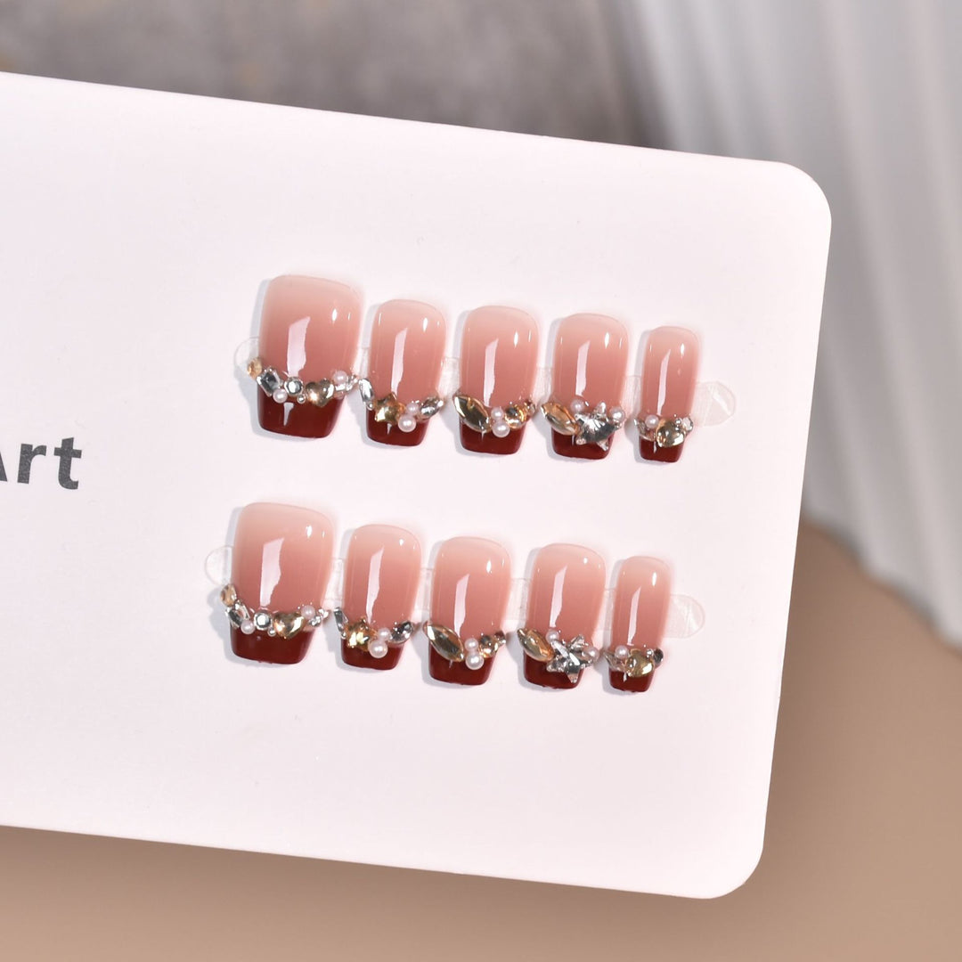 Elegant Press-On Nail Art with Gold Accents Bowlift