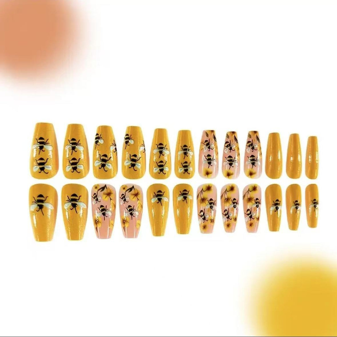 Nail art set with creative bee and flower designs Bowlift
