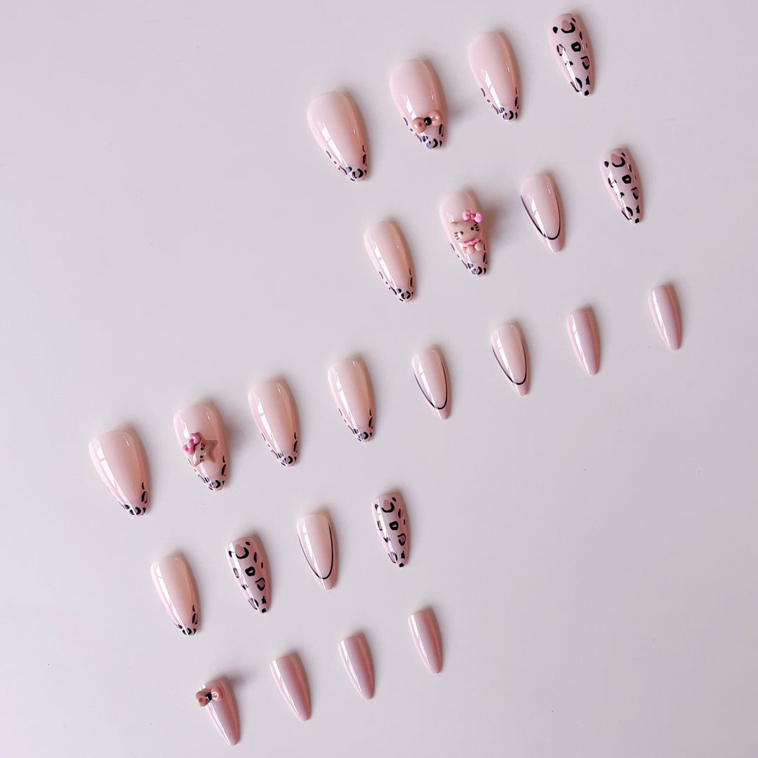 Artificial nail set with playful animal motifs and glitter accents Bowlift
