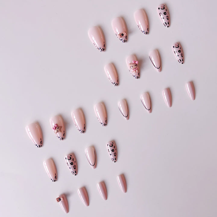Artificial nail set with playful animal motifs and glitter accents Bowlift