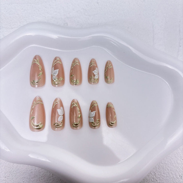 Elegant artificial nails with marble and gold accents Bowlift