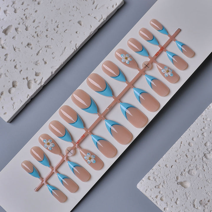 Artistic Press-On Nail Kit with Floral Accents Bowlift