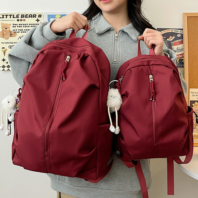 Lightweight urban backpack with multifunctional side pockets Bowlift