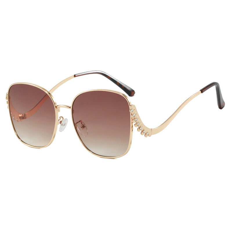 Women's striking sunglasses with sparkling appliqués Bowlift
