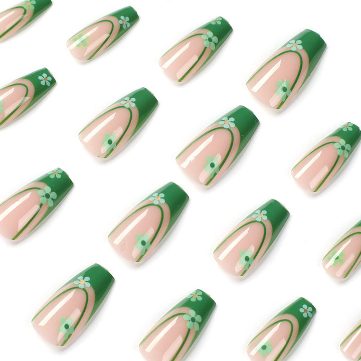 Artful nail art with floral accents and elegant design Bowlift
