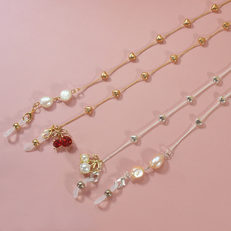 Elegant jewelry ribbon with pearls and silver accents Bowlift