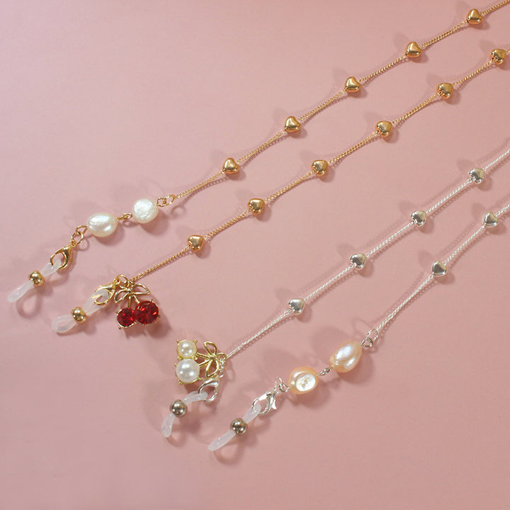 Elegant jewelry ribbon with pearls and silver accents Bowlift