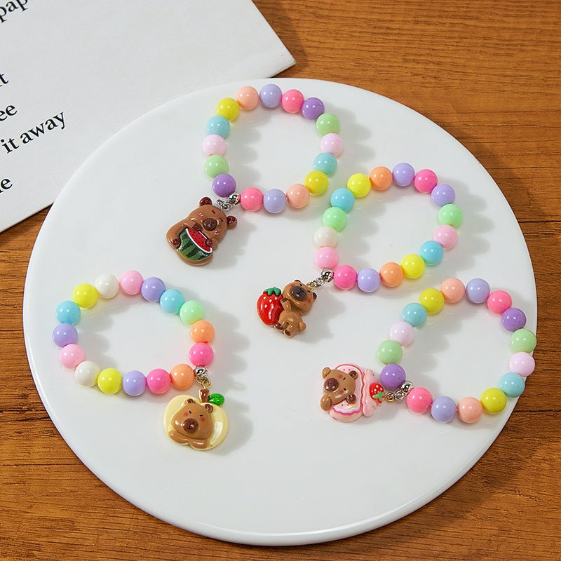 Colorful children's bracelet with crafted pendant Bowlift