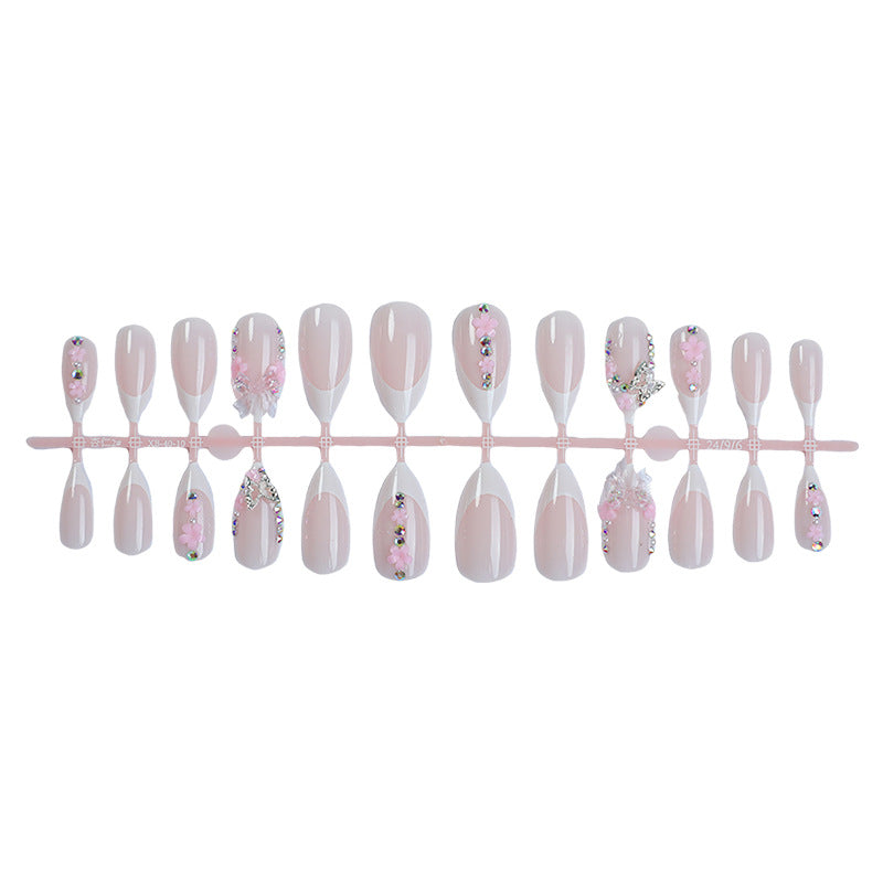 Creative nail art set with playful flower and glitter accents Bowlift