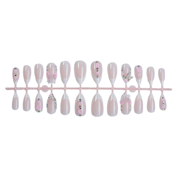 Creative nail art set with playful flower and glitter accents Bowlift