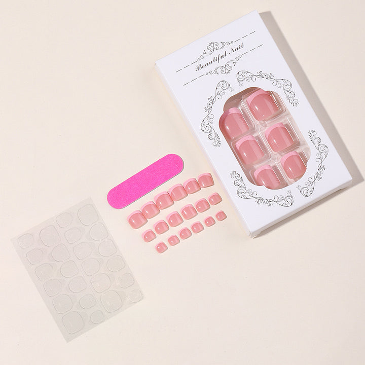Nail art set with elegant French design and glitter accents Bowlift