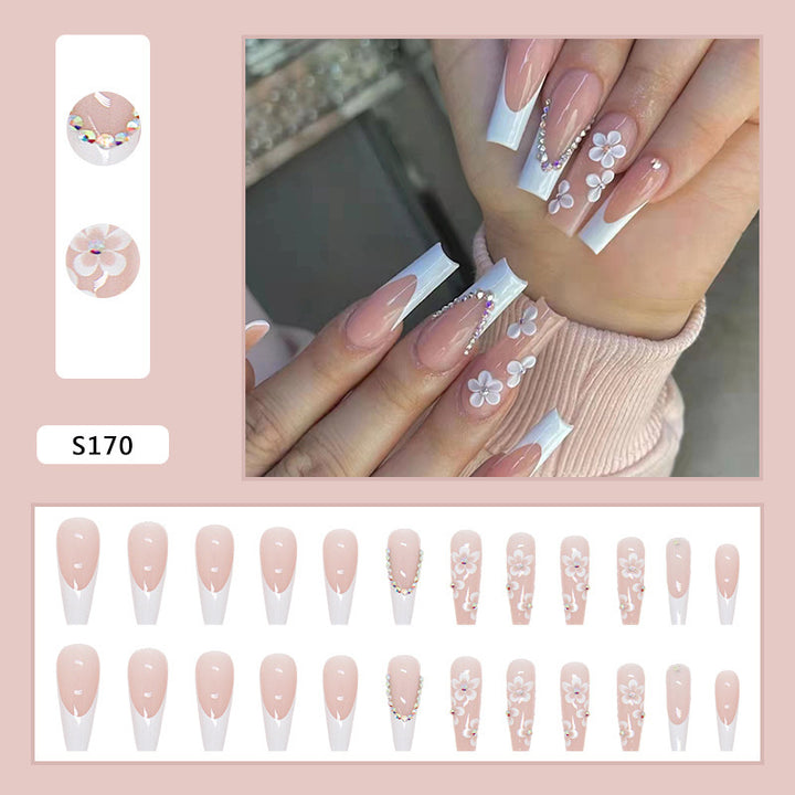 Artificial nail set with romantic floral decorations and glitter accents Bowlift