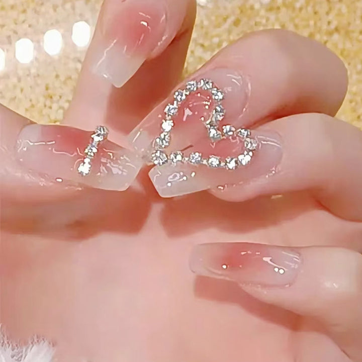 Artificial nails with romantic heart decorations Bowlift